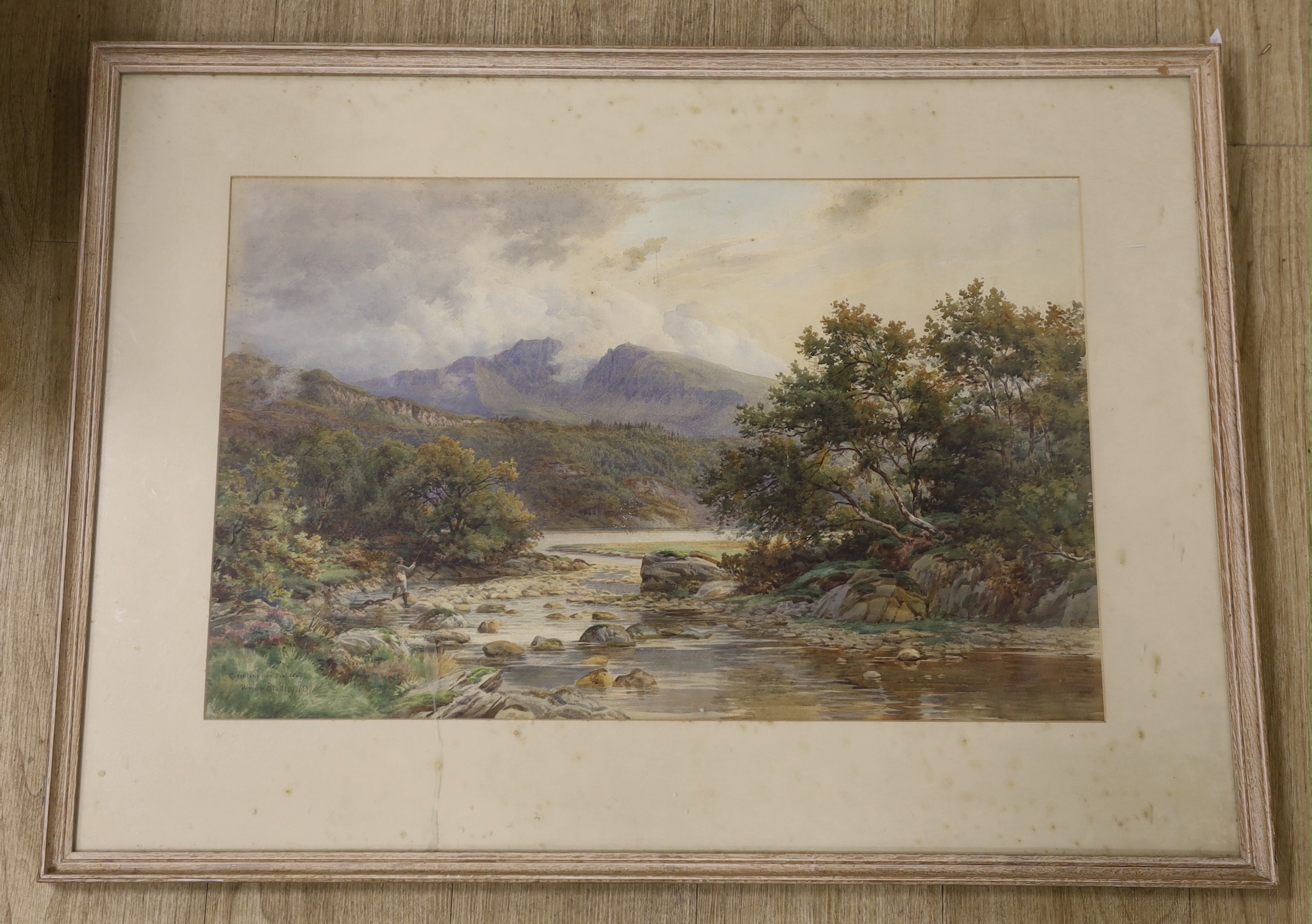 William Bradley, 19th century, watercolour, angler amongst lake scape, signed, inscribed and dated 1889, 42 x 67cm